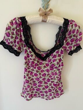 Urban Outfitters Sheer Floral Blouse with Black Lace Details
Size: Small
NWOT